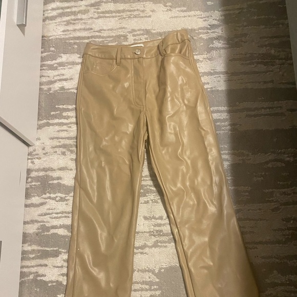 Got these at a random boutique- never worn. Tan cropped leather pants. - Picture 2 of 3